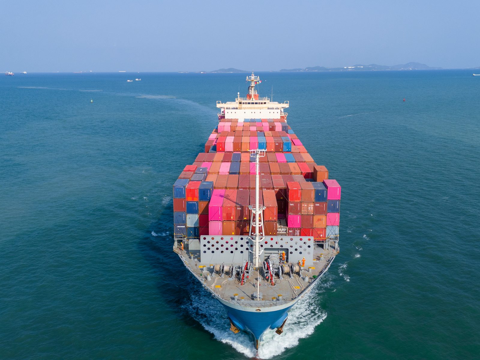 Container ship carrying international cargo between two foreign ports