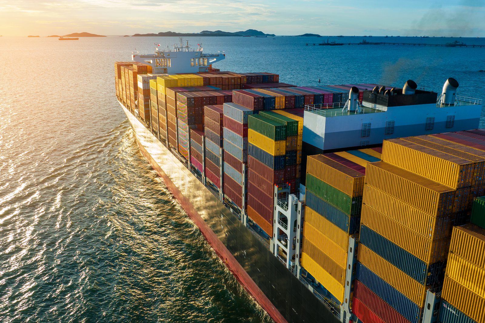 Container vessel carrying cross trade cargo between two foreign ports